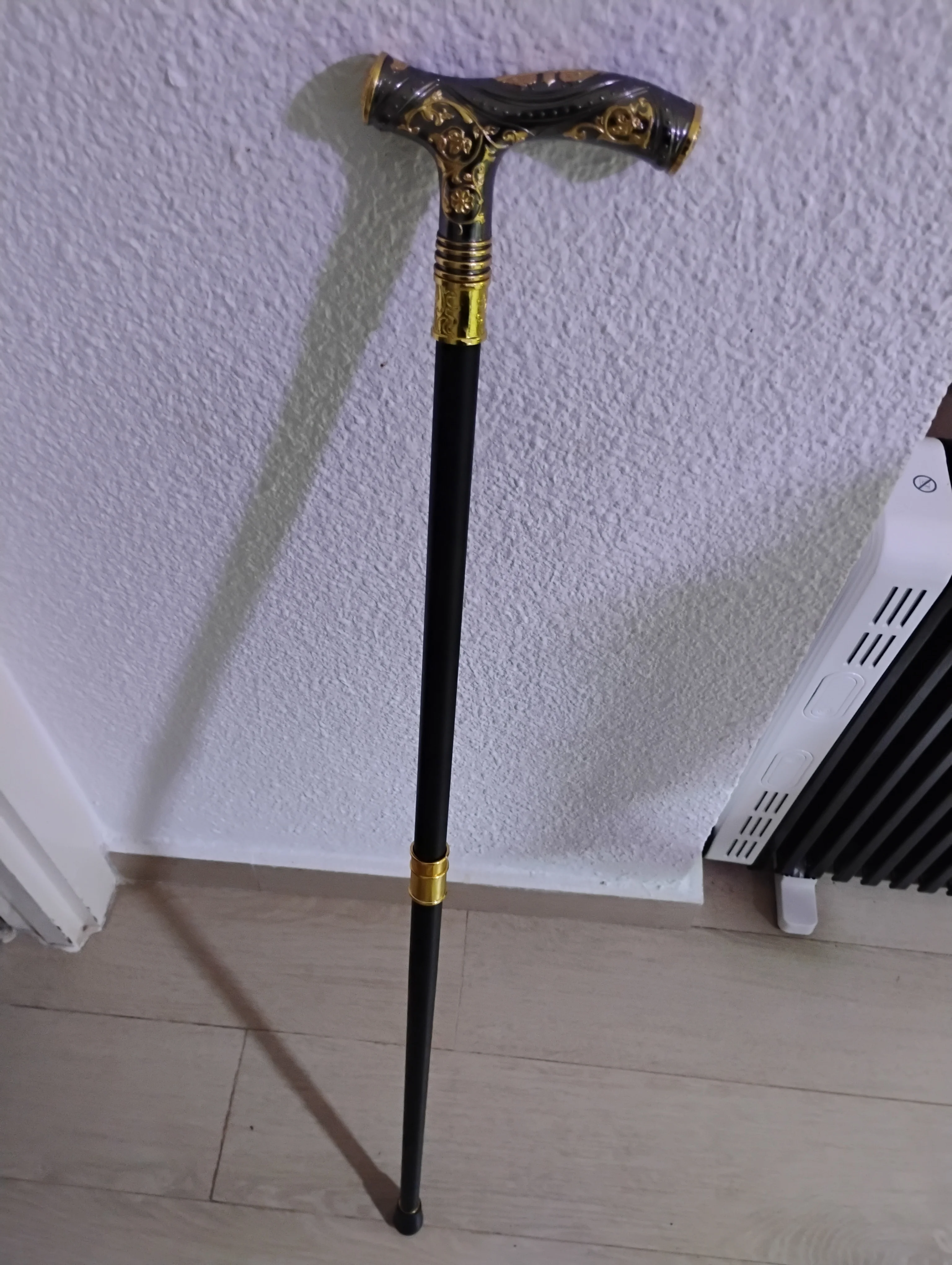 Foto de un comprador: Bastón decorativo con empuñadura metálica de oso dorado