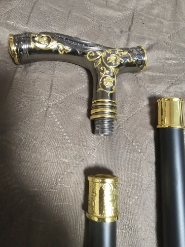 Foto de un comprador: Bastón decorativo con empuñadura metálica de oso dorado