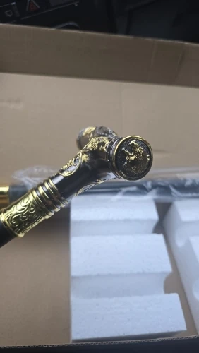 Foto de un comprador: Bastón decorativo con empuñadura metálica de oso dorado