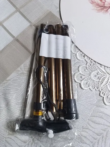 Foto de un comprador: Bastón plegable de aluminio de 5 niveles con dragonera